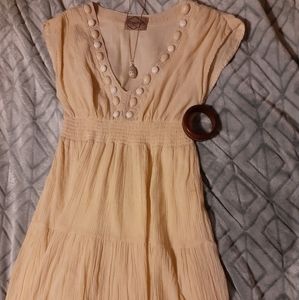 Babydoll style dress. Made by Dejavu.